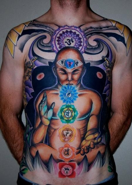 Mystical looking colored chest and belly tattoo of mysterious statue with Hinduism symbols