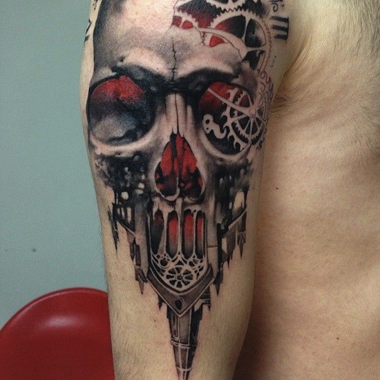 Mystical looking colored shoulder tattoo of human skull with old cathedral