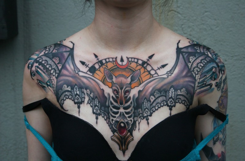 Mystical multicolored chest tattoo of nice bat