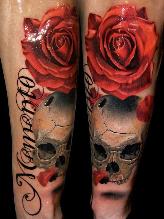 Natural colored big red rose tattoo on forearm with corrupted skull and lettering