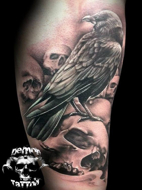 Natural looking 3D big colored crow tattoo combined with skulls