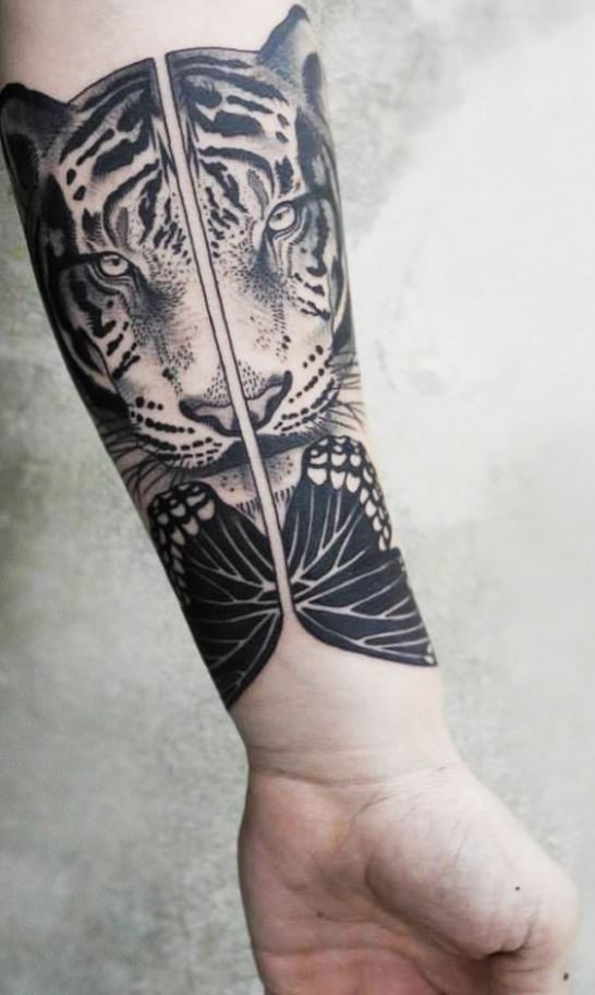 Natural looking beautiful black ink forearm tattoo of tiger with buterfly