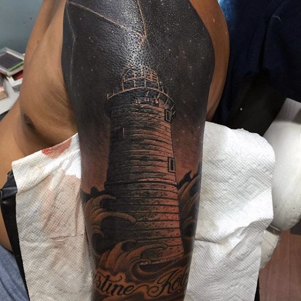 Natural looking black and white detailed lighthouse sleeve like  tattoo