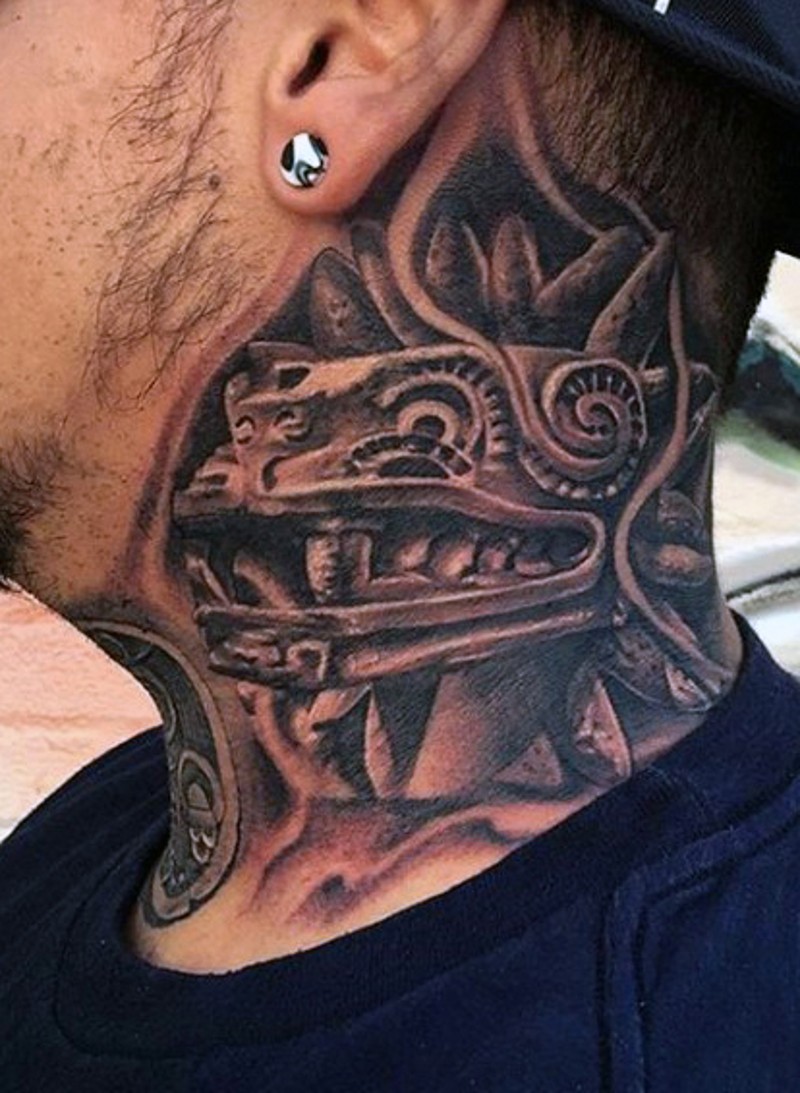 Natural looking black and white tribal statue tattoo on neck
