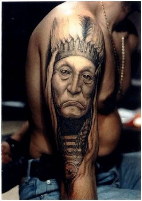 Natural looking black and whited old Indian portrait tattoo on shoulder zone