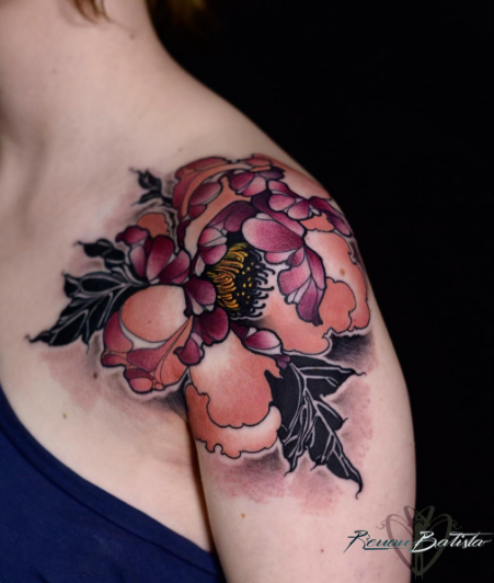 Natural looking colored shoulder tattoo of big flower