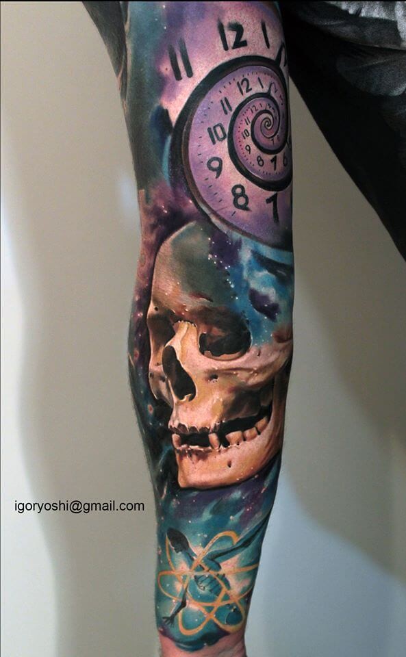 Natural looking colorful sleeve tattoo of human skull with hypnotic clock and space