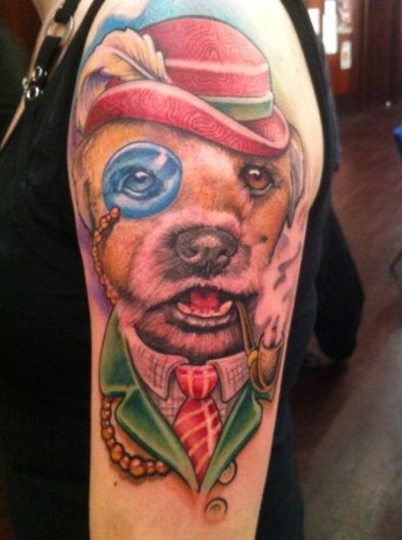 Natural looking colorful smoking gentleman dog tattoo on upper arm