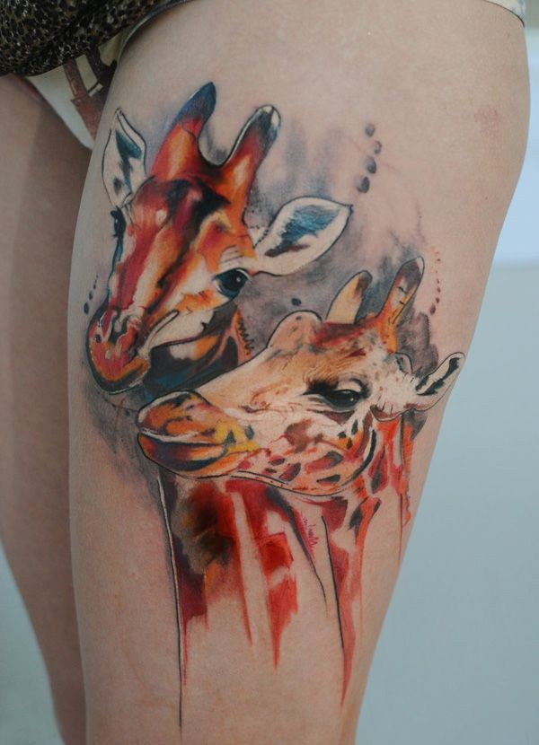 Natural looking illustrative style colored thigh tattoo of giraffe couple