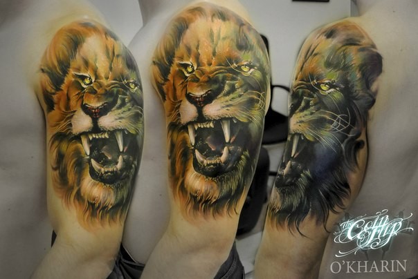 Natural looking realism style shoulder tattoo of roaring lion