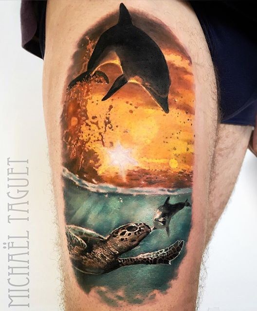 Natural looking realism style thigh tattoo of dolphin with turtles