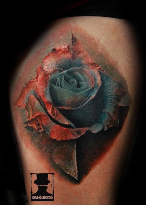 Natural looking realism style thigh tattoo of gorgeous rose