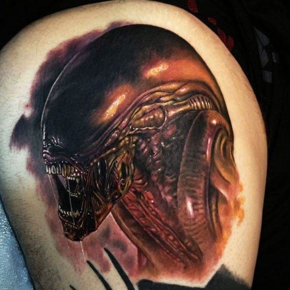 Natural looking very detailed thigh tattoo of evil Alien