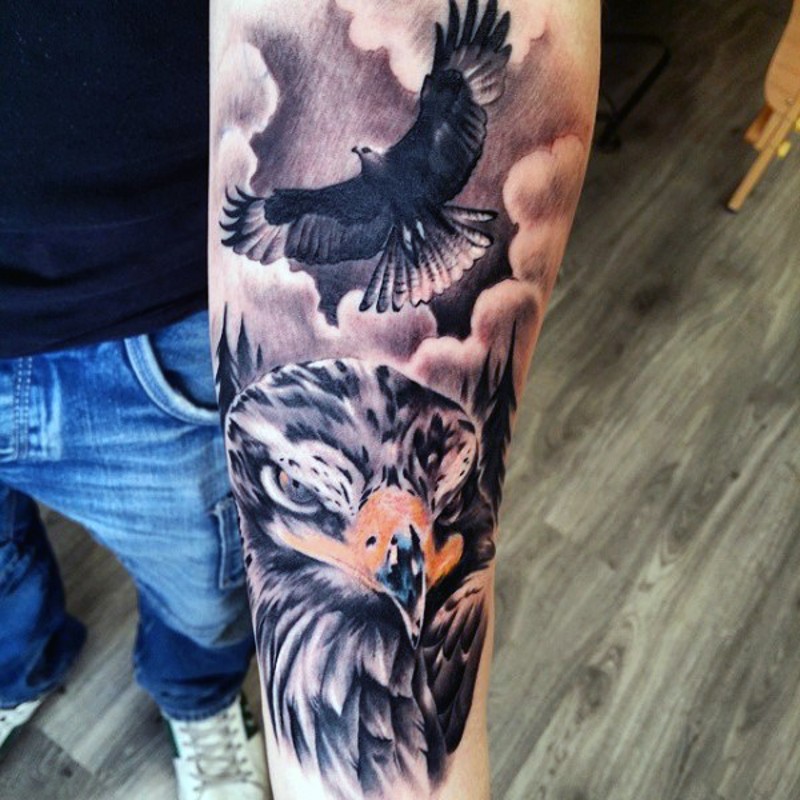 Natural painted detailed and colored forearm tattoo of flying eagle