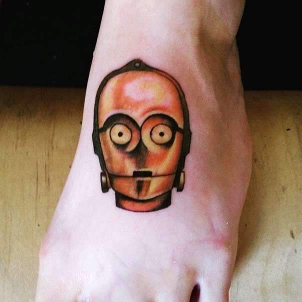 Naturally colored C-3PO Star Wars hero tattoo on foot