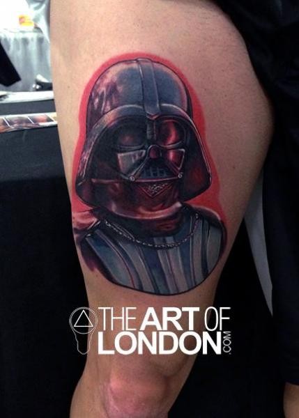 Naturally colored Darth Vader&quots portrait tattoo on man&quots biceps