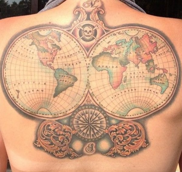 Nautical themed colorful globes tattoo on back stylized with compass and skull