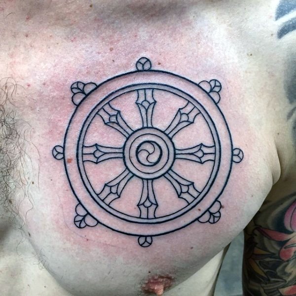 Neat dark black sailor&quots helm detailed chest tattoo