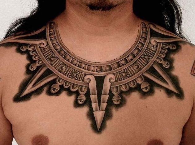 Necklace in style culture of aztecs tattoo on chest