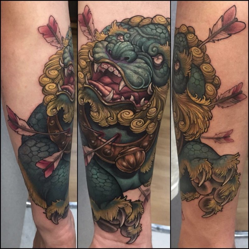 Neo japanese style colored arm tattoo of fantasy lion with arrows