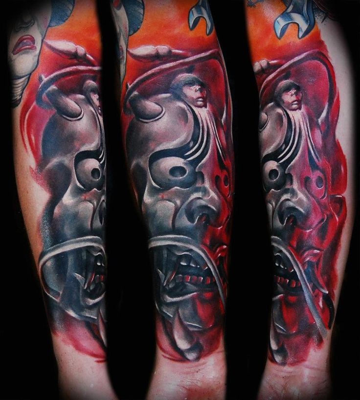 Neo japanese style colored arm tattoo of demon mask