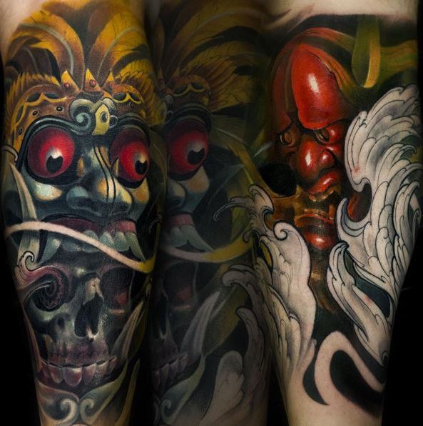Neo japanese style colored arm tattoo of demonic masks with skull