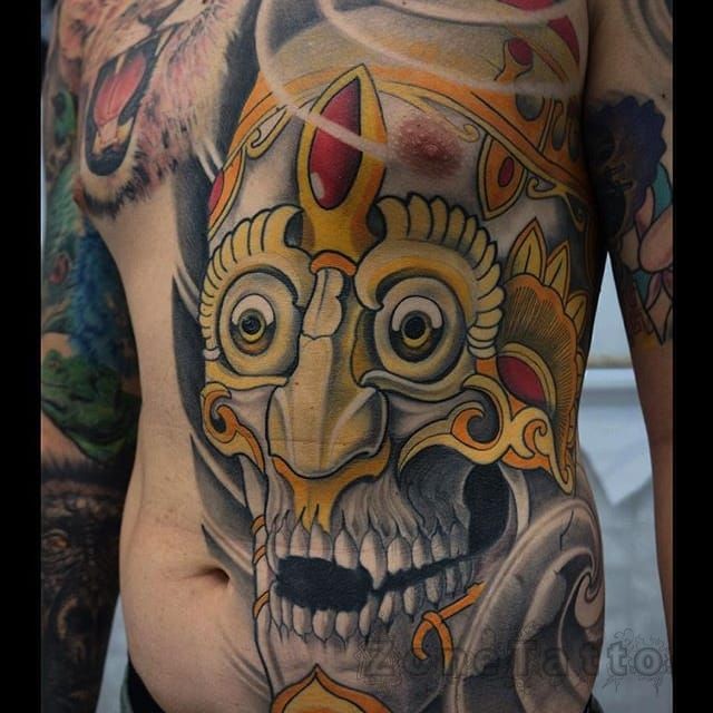 Neo japanese style colored belly and chest tattoo of demonic mask