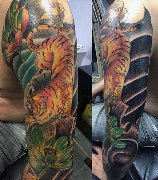 Neo japanese style colored shoulder tattoo of tiger in jungle