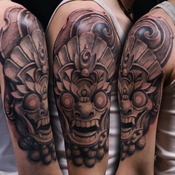 Neo japanese style shoulder tattoo of cool stone statue