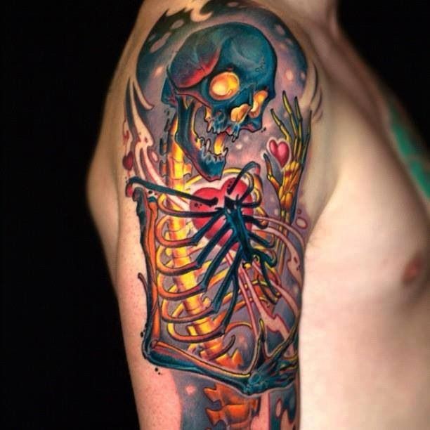 Neo school style colored shoulder tattoo of human skeleton with hear