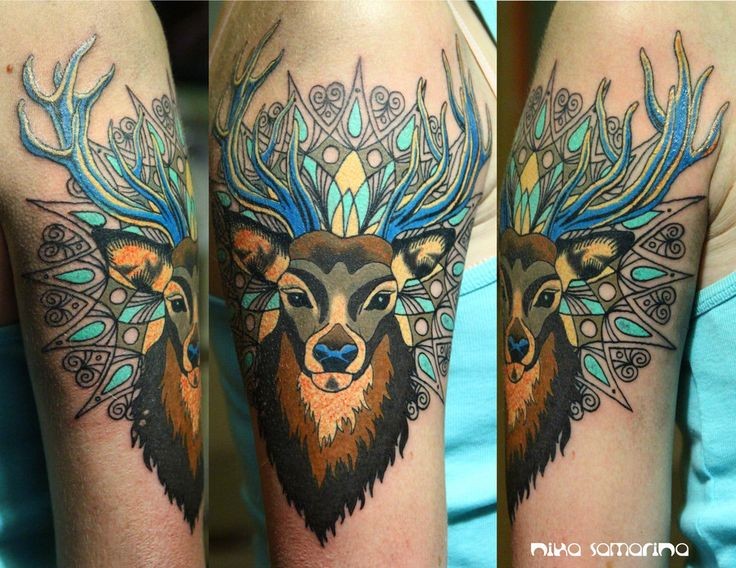 Neo traditional colored arm tattoo of deer with ornaments