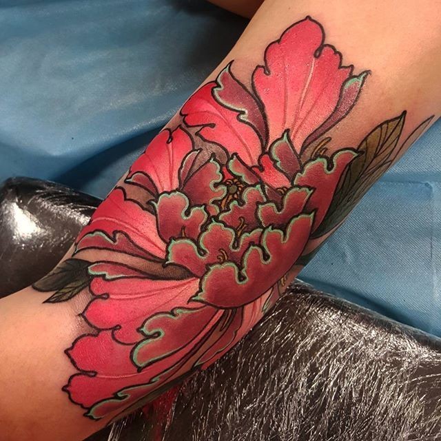 Neo traditional style colored arm tattoo of big beautiful flower