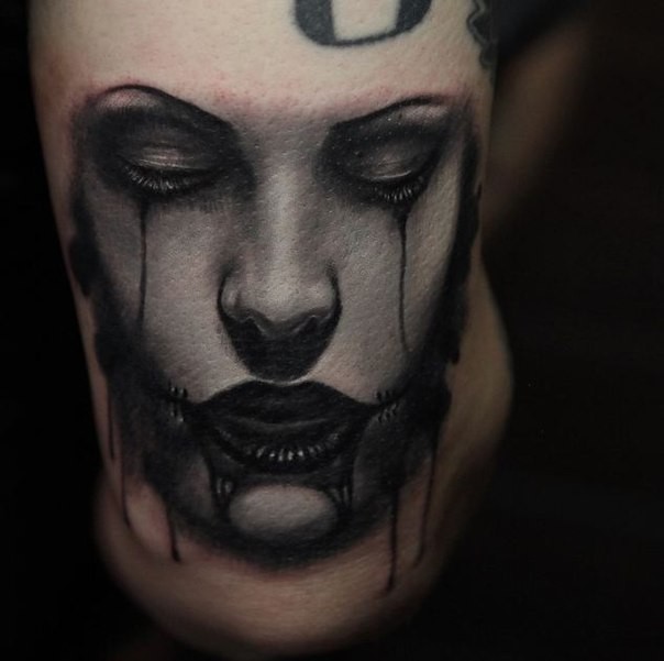 Neo traditional style colored creepy woman face tattoo
