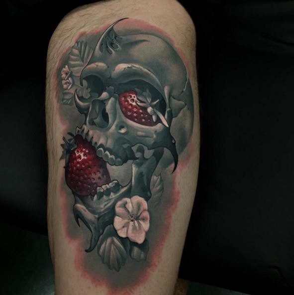 Neo traditional style colored tattoo of human skull with flowers and strawberry