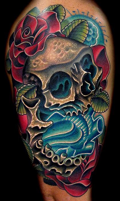 Neo traditional style colored tattoo of human skull with blue heart