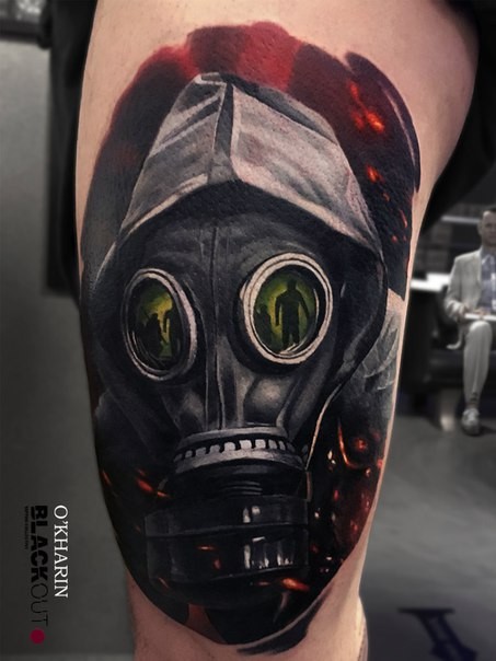 Neo traditional style colored thigh tattoo of man with gas mask