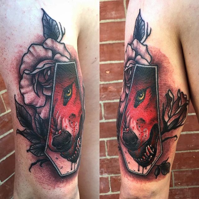 New colorful upper arm tattoo of coffin with bloody wolf and rose by Michael J Kelly