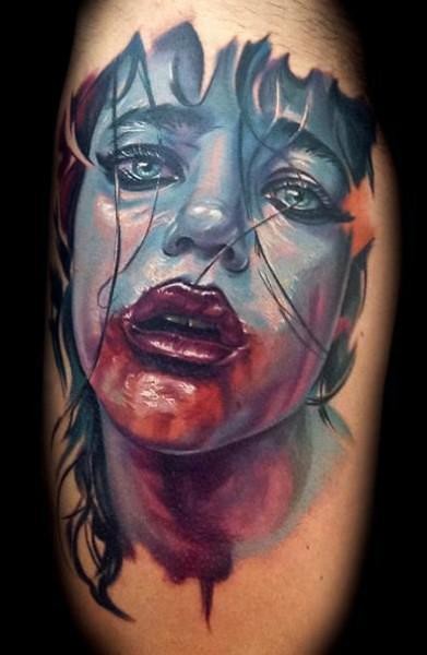 new school style colored arm tattoo of bloody monster woman portrait