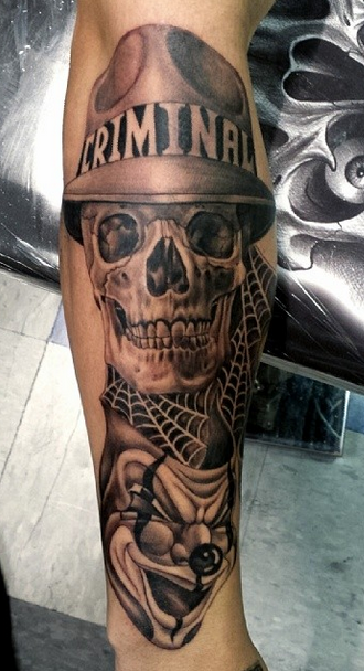 New school style colored arm tattoo of skeleton with hat and lettering
