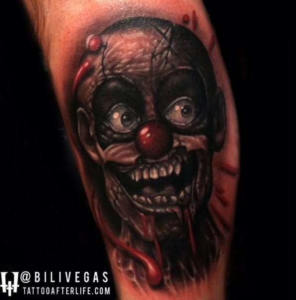 New school style colored arm tattoo of creepy clown