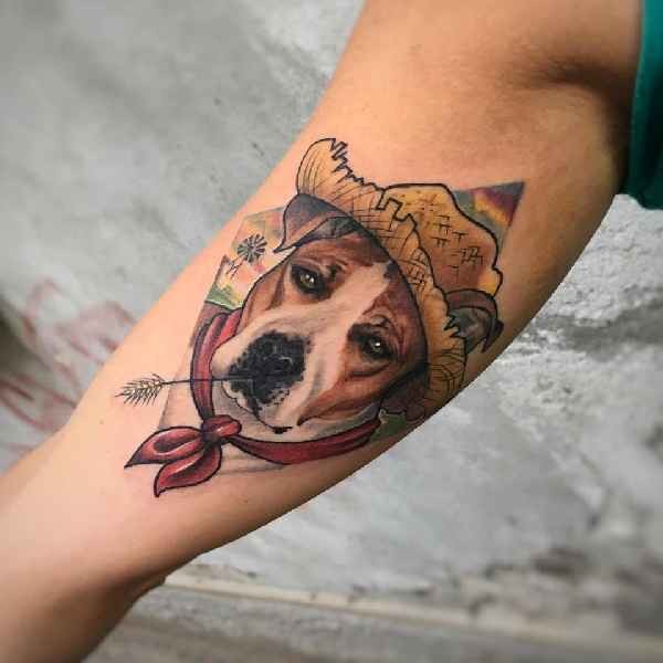 New school style colored arm tattoo of sad dog in hat