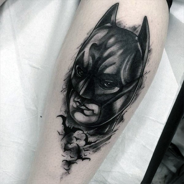 New school style colored arm tattoo of Batman face and bats