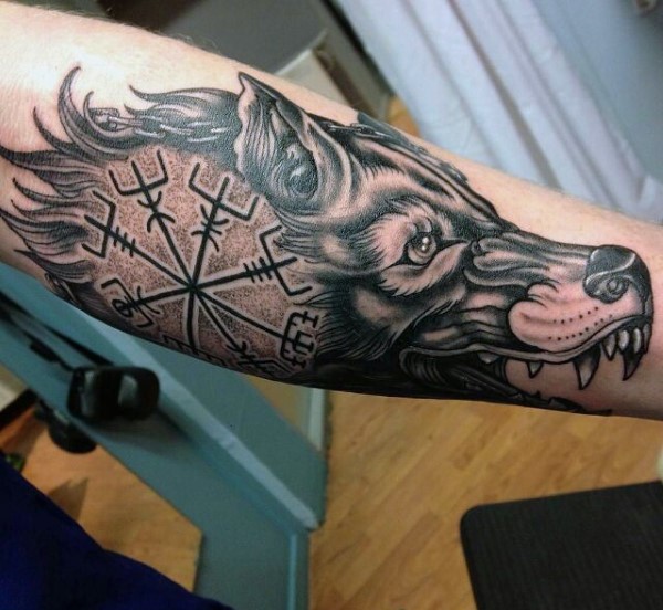 New school style colored arm tattoo of wolf head stylized with ancient ...