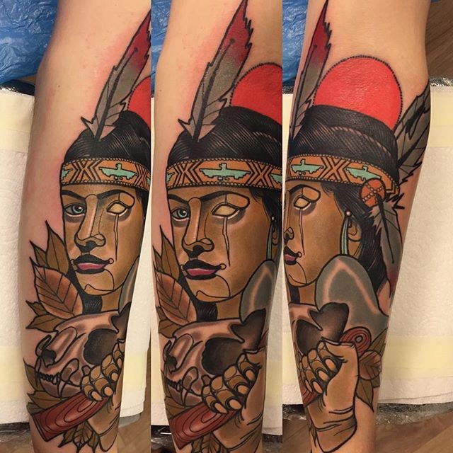 New school style colored arm tattoo of creepy Indian woman with skull and feather