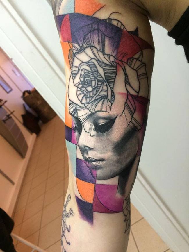 New school style colored arm tattoo of woman face with roses