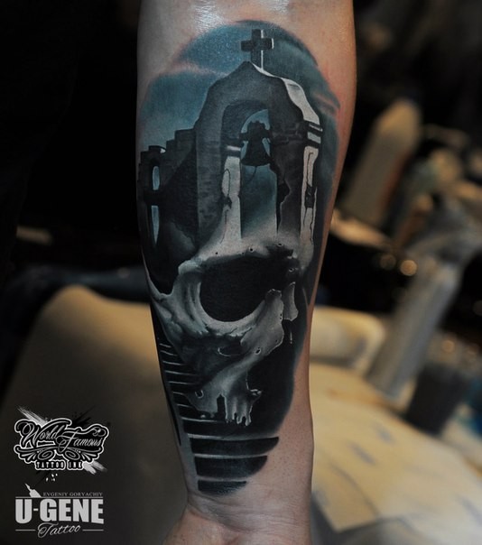 New school style colored arm tattoo of human skull stylized with cemetery