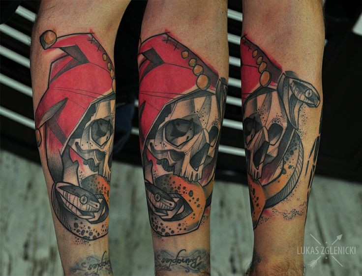 New school style colored arm tattoo of human skull with snake and red hat