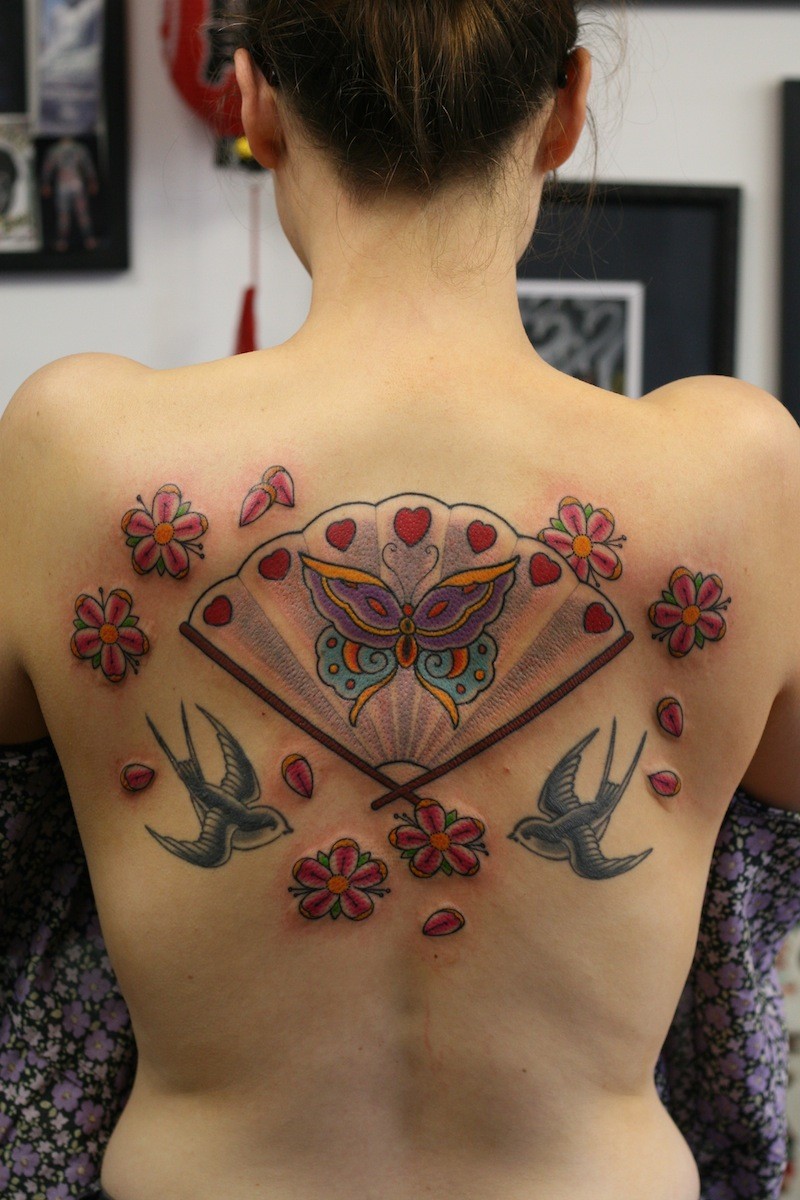 New school style colored back tattoo fo Asian fan with flowers and birds