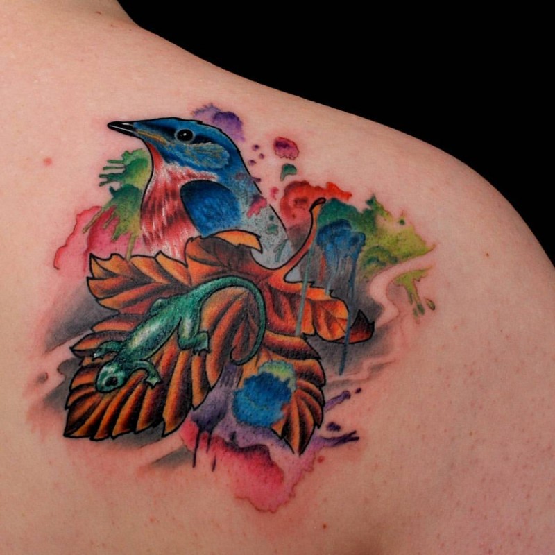 New school style colored back tattoo of bird with lizard and leaf