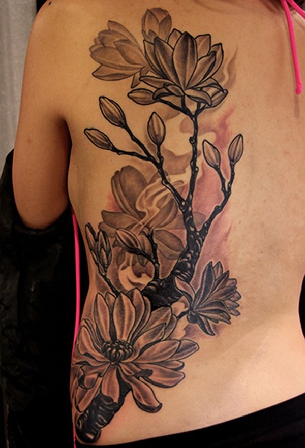 New school style colored back tattoo of beautiful flowers